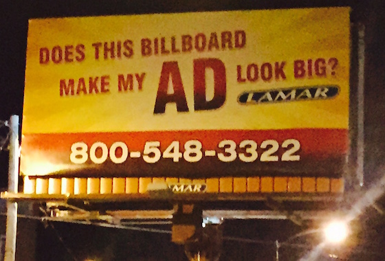 poorly advertised vacant billboard